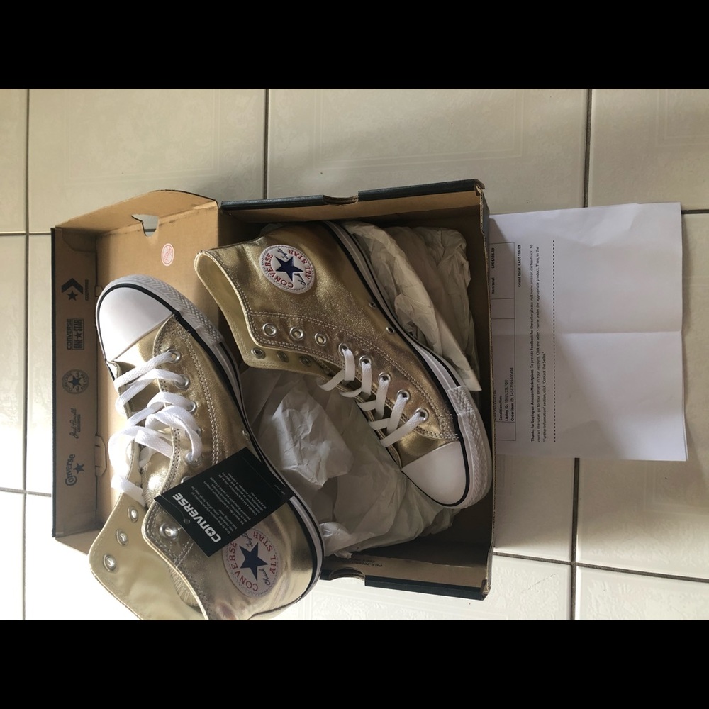 Gold metallic high top converse